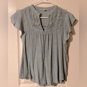 Teal women’s shirt size large. Light and flowy material, perfect for summer!
